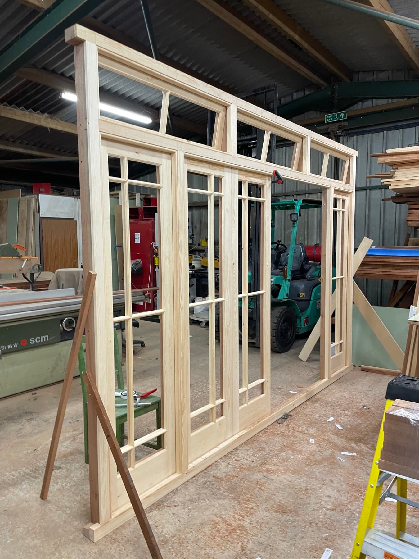 Close detail of finished timber sash joinery and ironmongery